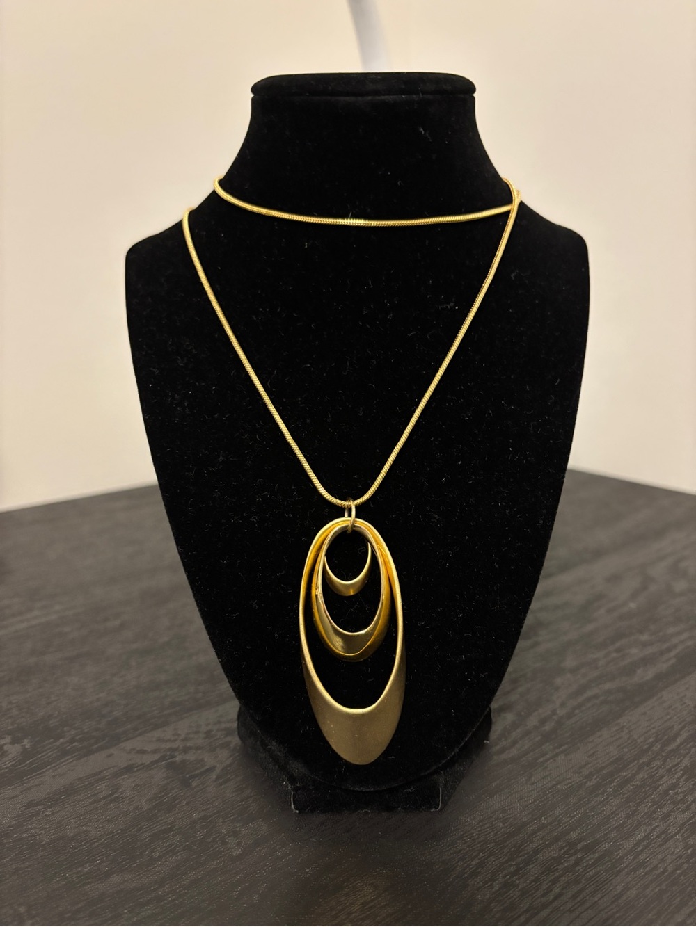 Gold tone Triple Oval Pendant Necklace